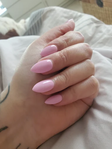 Pastel pink almond nails at L.A. Nails Traverse City